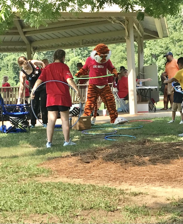 Aubie enjoying games with families