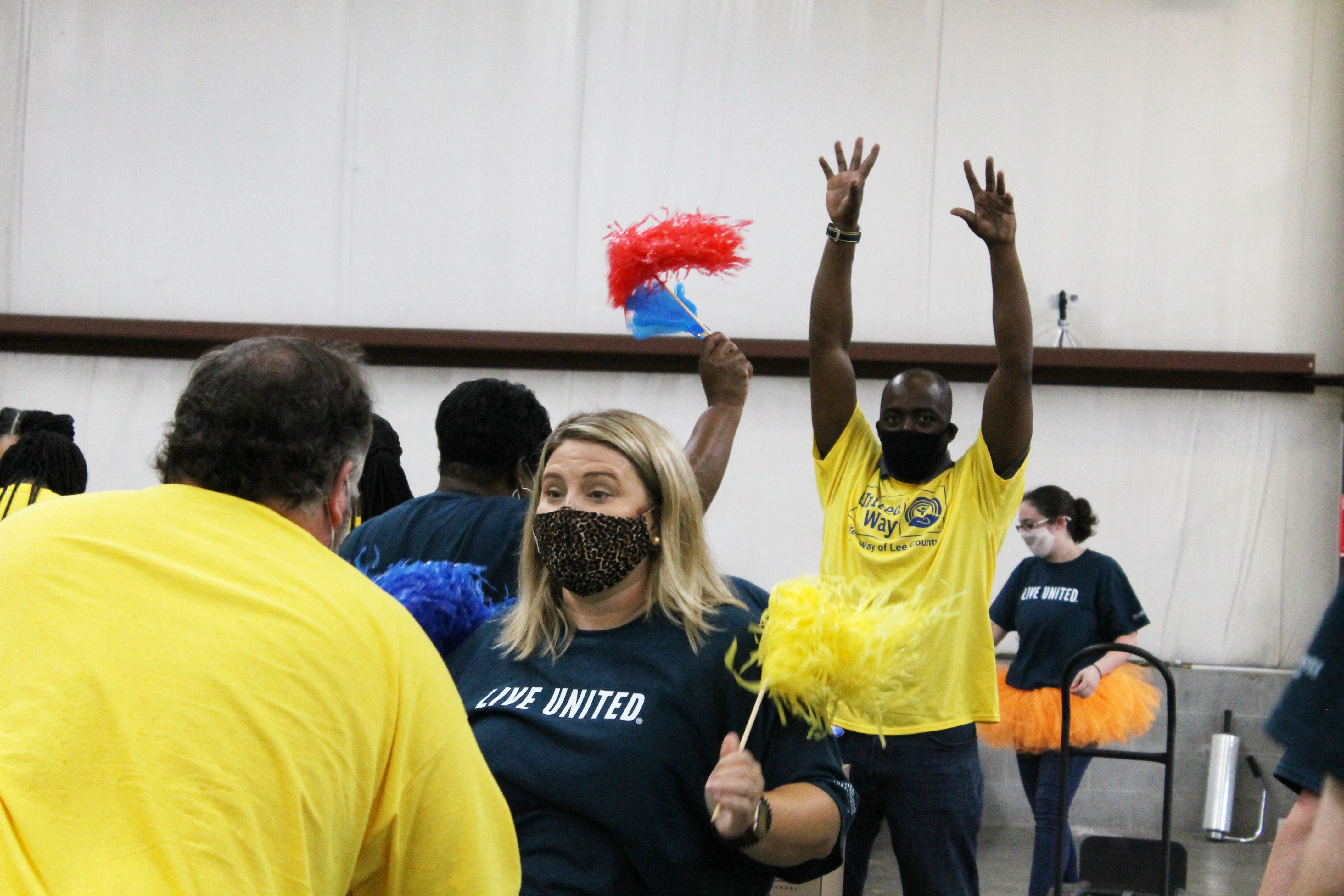 Volunteers cheering