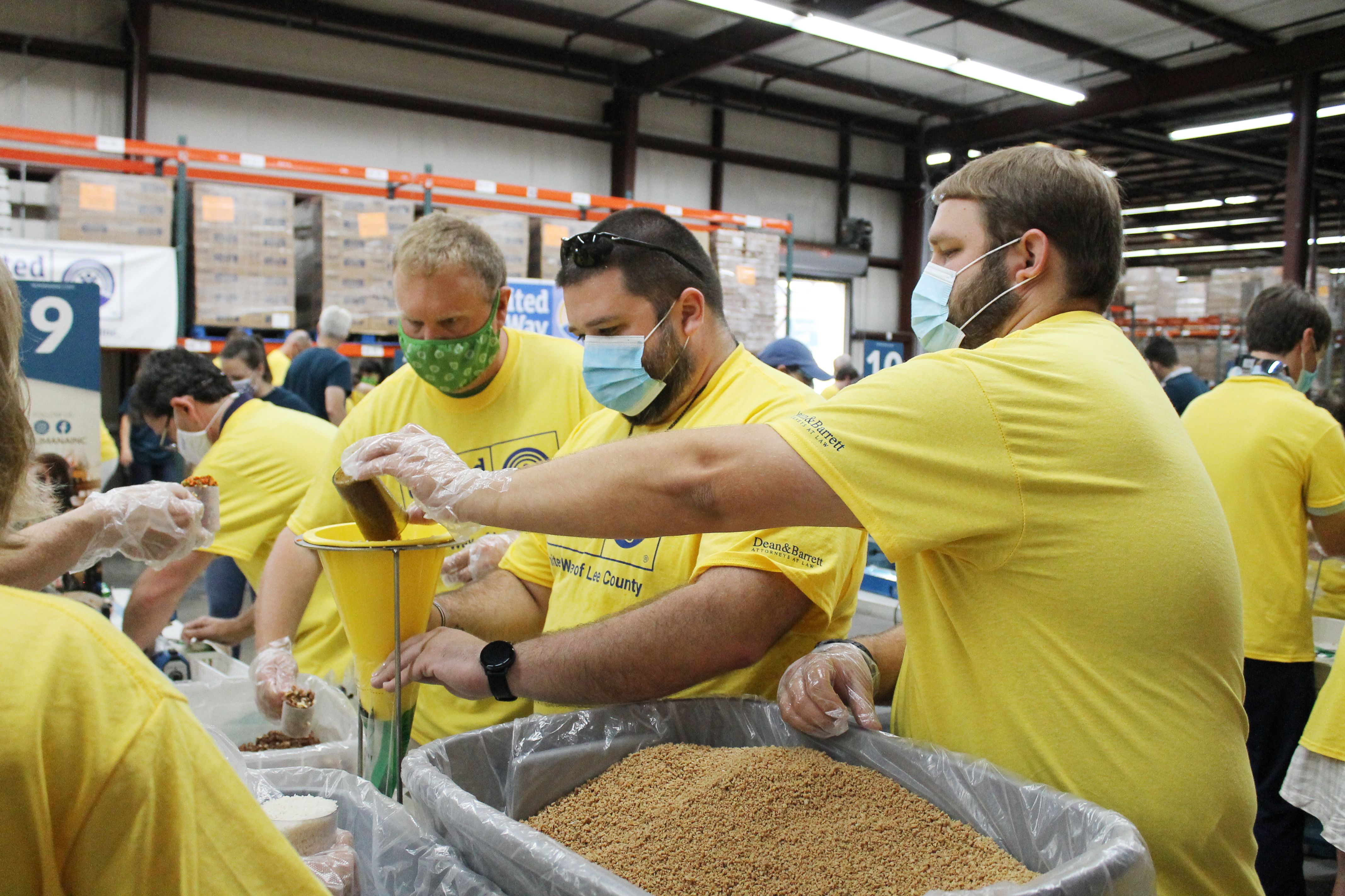 Volunteer packing food