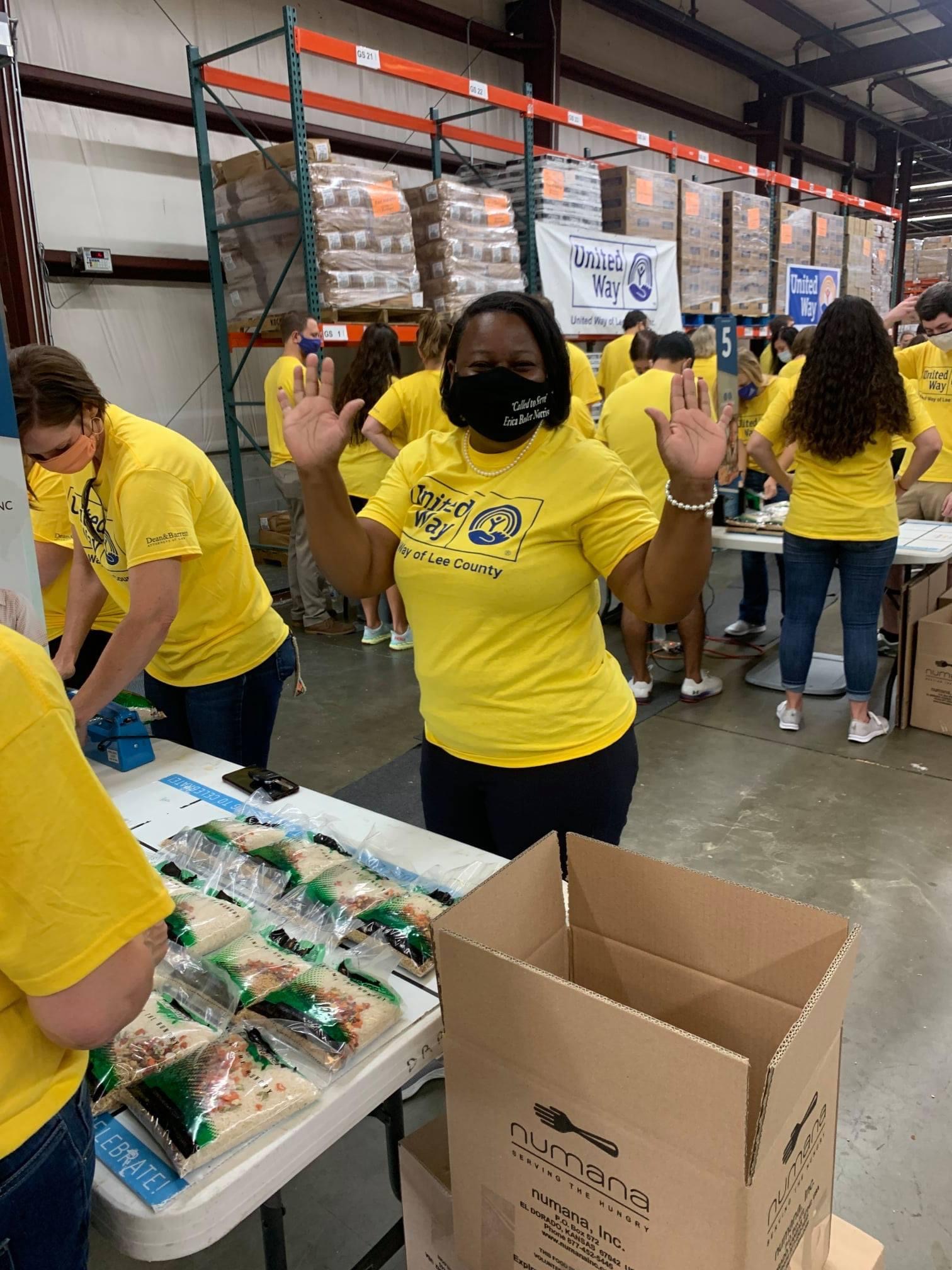 Volunteers packing food