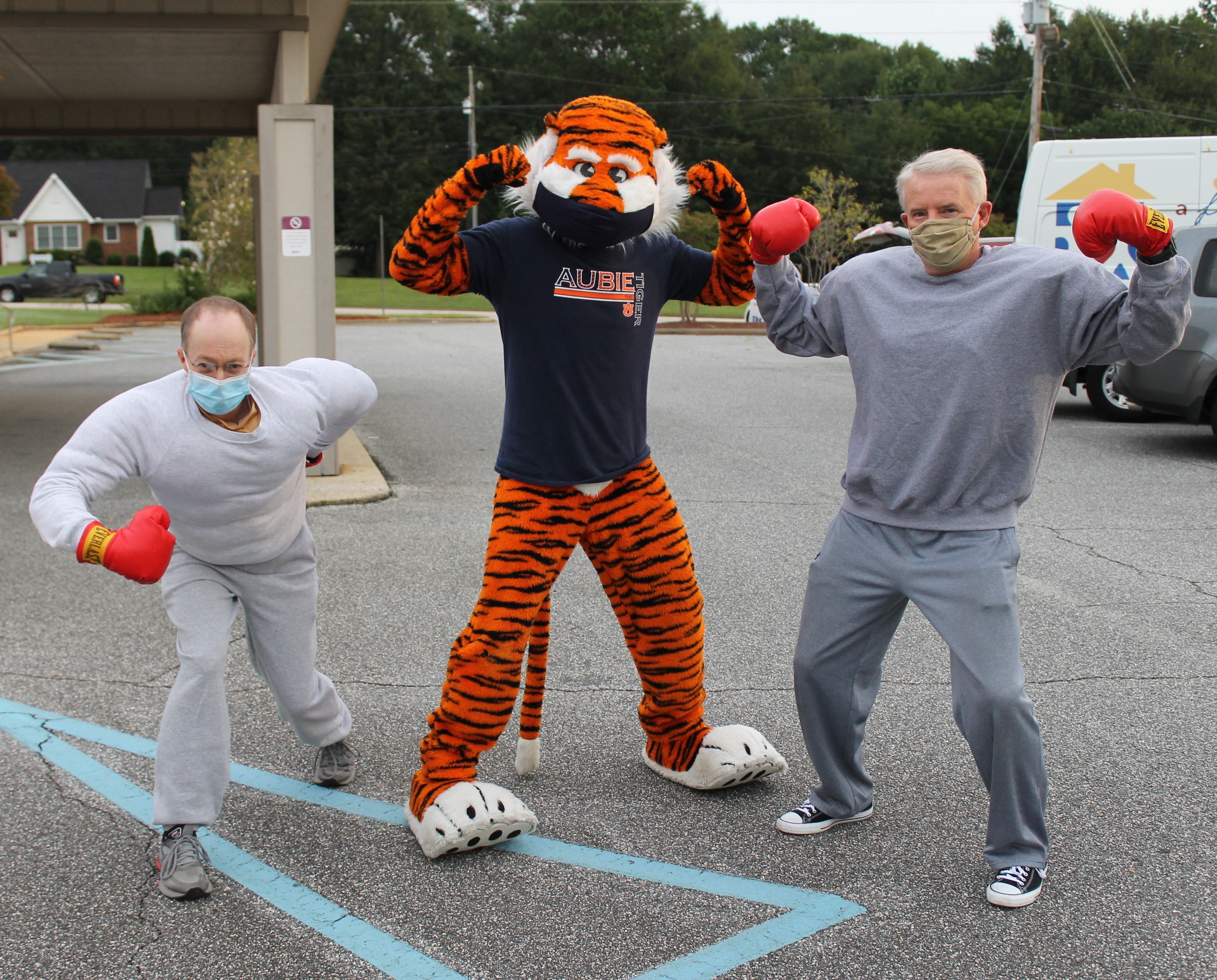 Aubie, Hanz, and Franz flexing their muscles