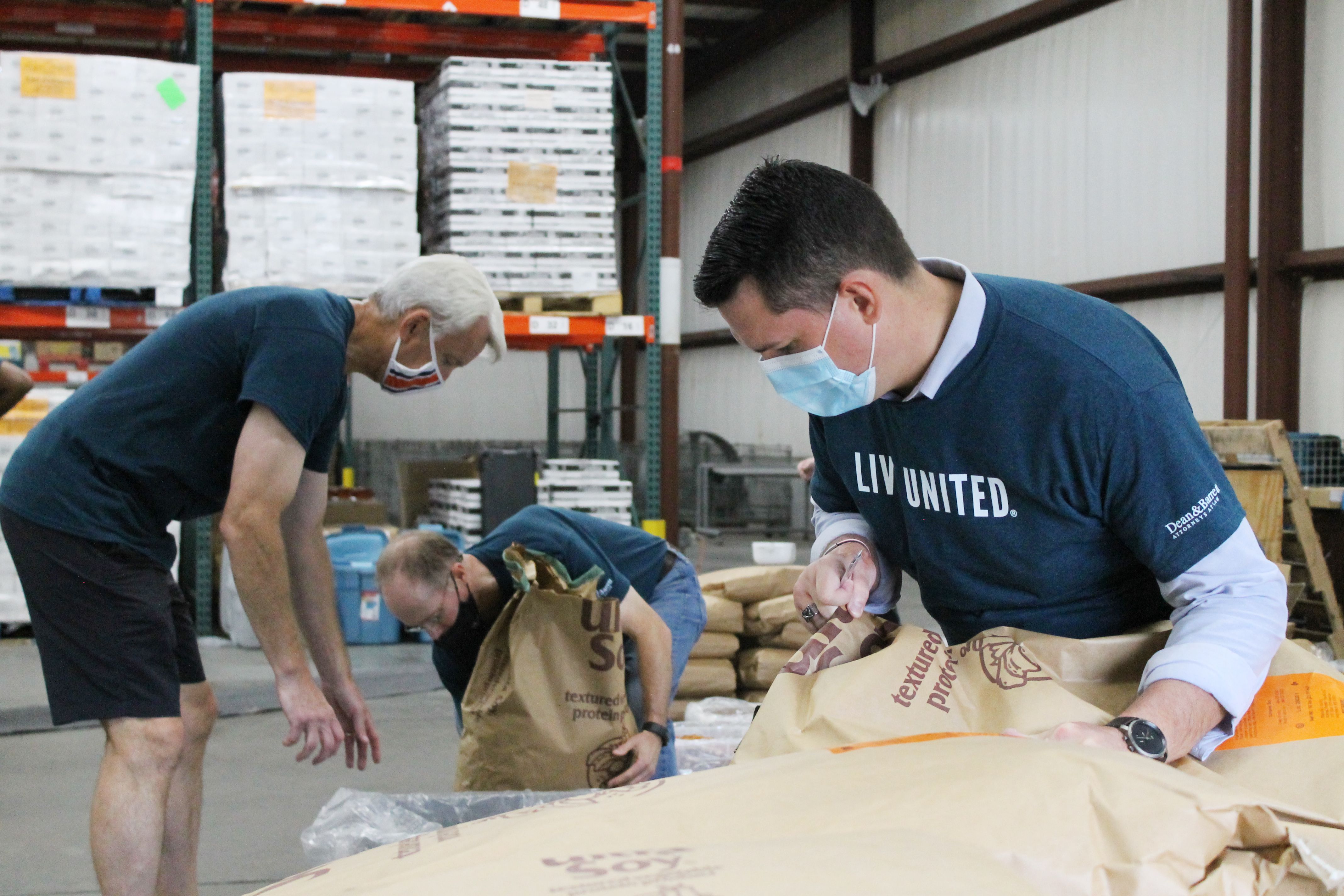 Volunteers packing food