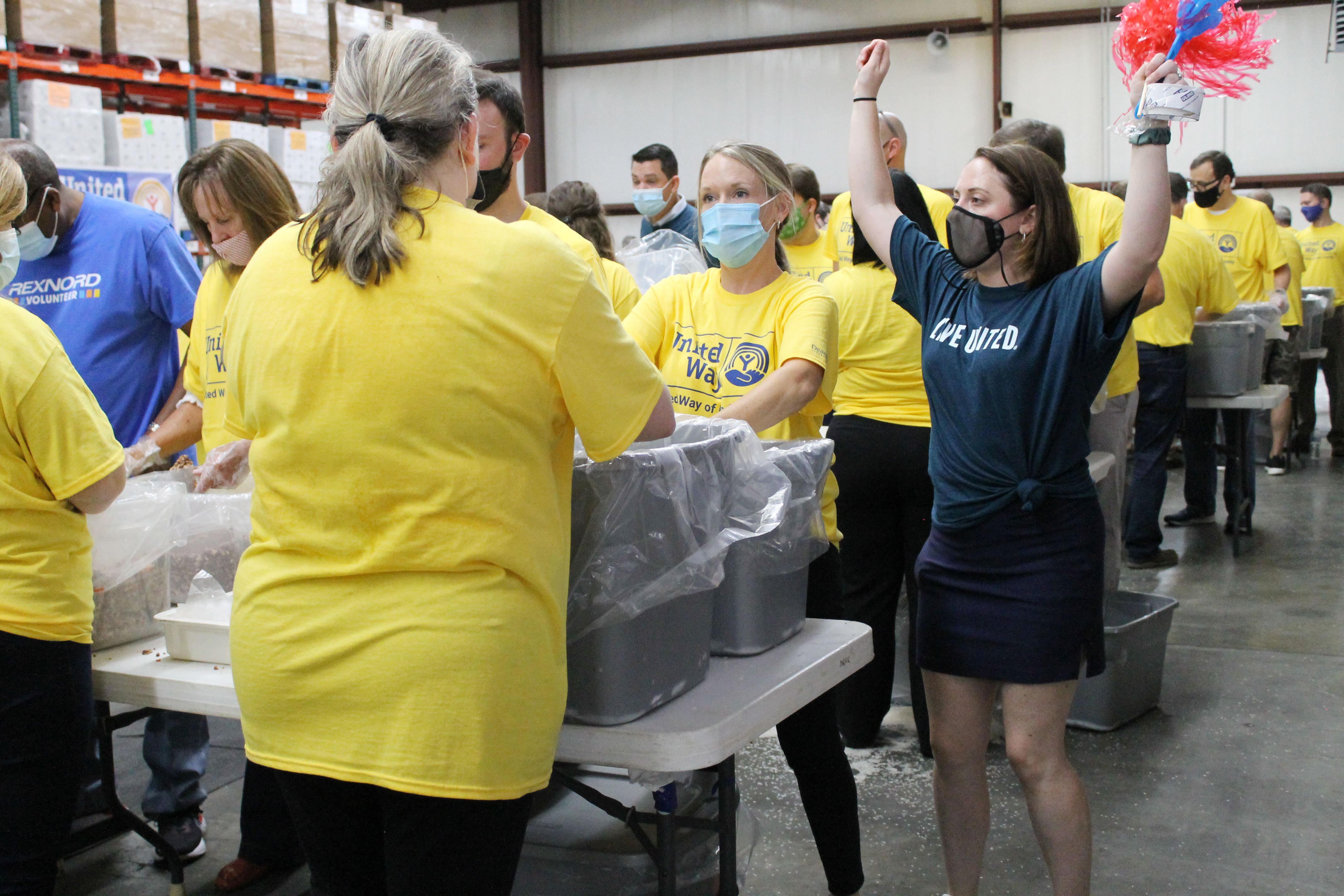 Volunteers packing food