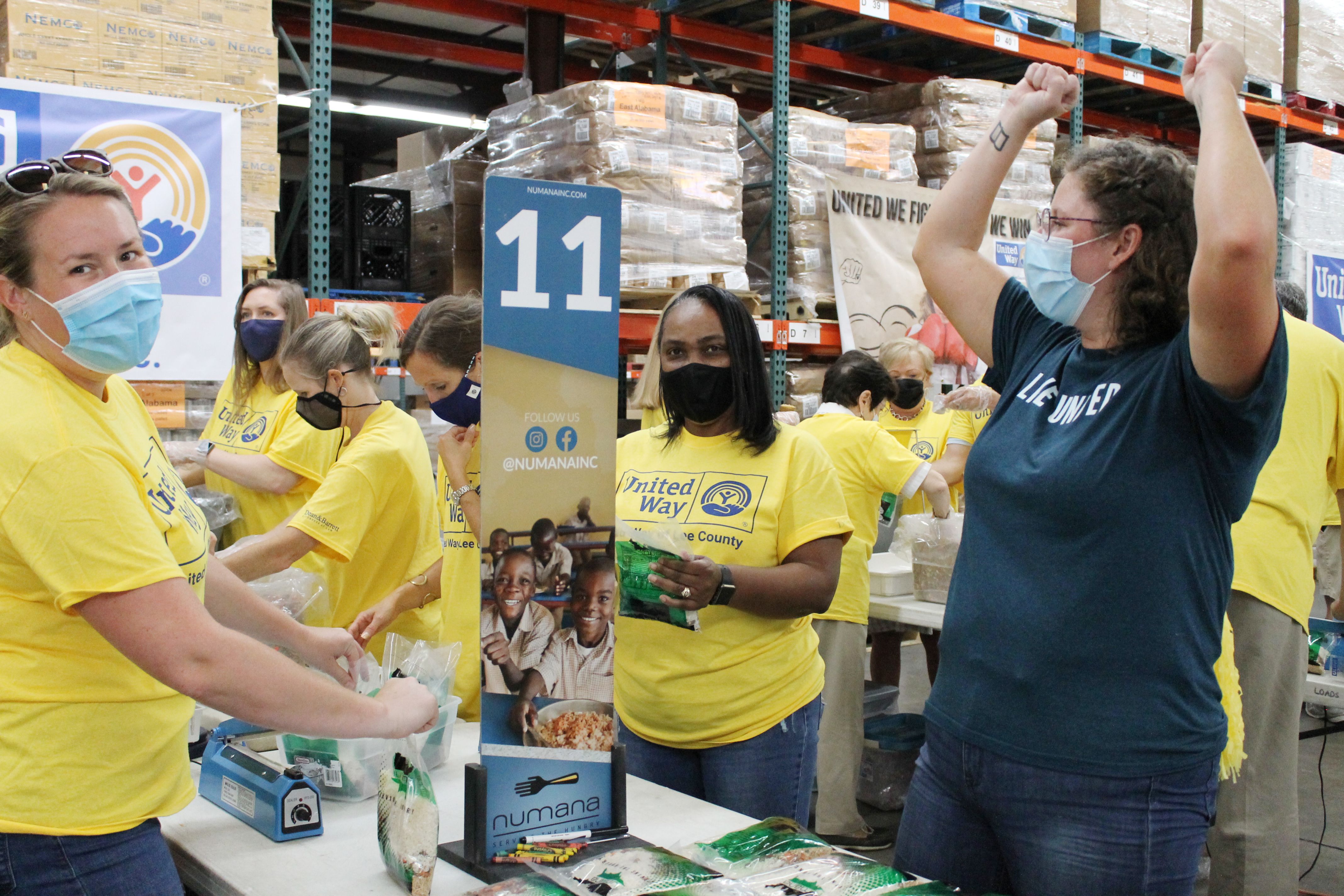 Volunteers packing food