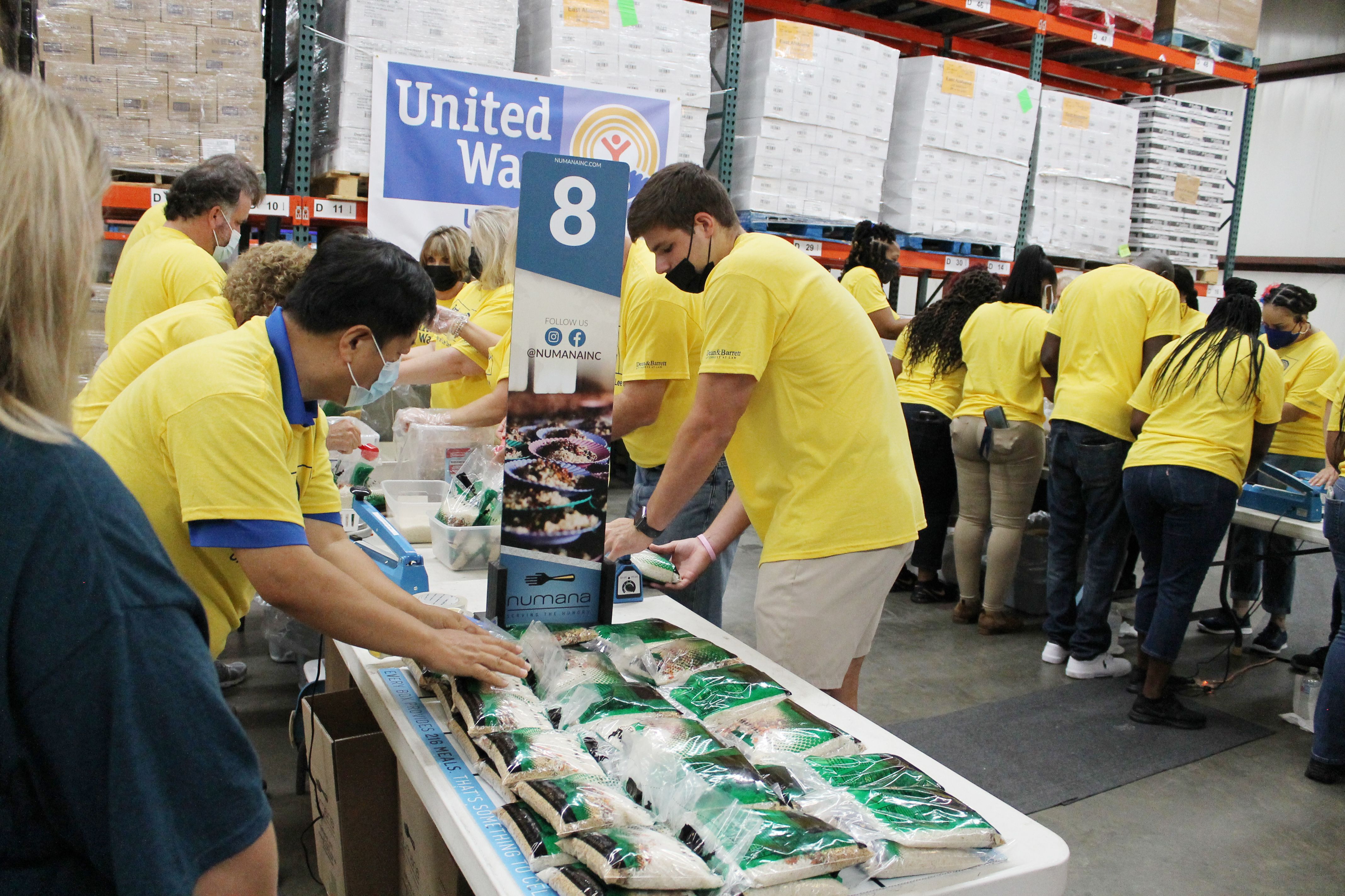 Volunteers packing food